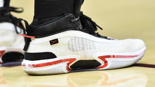 View of white and black Jordan shoes.